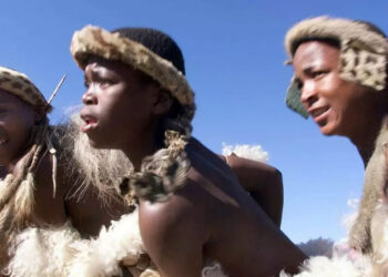 Zulu girls in South Africa dance before their king
