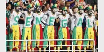 BRILLIANT LIONS OF TERANGA . . . Africa smiles as Senegal cruise into last 16