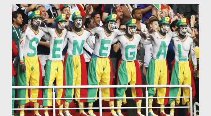 BRILLIANT LIONS OF TERANGA . . . Africa smiles as Senegal cruise into last 16