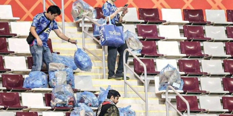 Japanese football fans, as they always do after a match, clean up the stadium. Japan shocked Germany 2-1 in their Group E encounter at the ongoing 2022 FIFA World Cup in Qatar