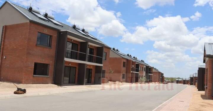 Construction workers putting final touches to the 220 houses the Government is building for its workers at Beitbridge Border Post