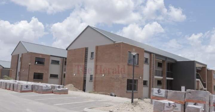 Construction workers putting final touches to the 220 houses the Government is building for its workers at Beitbridge Border Post