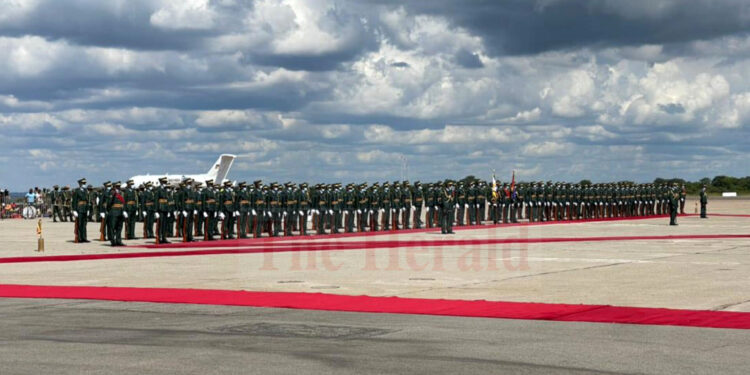 Belarus President Alexander Lukashenko has arrived at the RGM International Airport and is now, together with his Zimbabwean counterpart President Mnangagwa, inspecting the Guard Of Honour mounted by the Zimbabwe National Army’s Presidential Guard. Scores of people have thronged the Airport to welcome the visiting Belarusian President.