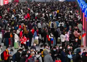 China ends quarantine for overseas travellers