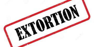 Four detectives in court on charges of extortion