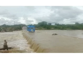Rivers in flood! . . Man (63) plus donkeys yoked to cart swept away