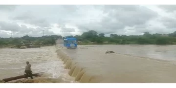 Rivers in flood! . . Man (63) plus donkeys yoked to cart swept away