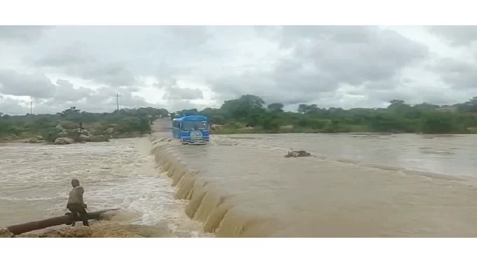 Rivers in flood! . . Man (63) plus donkeys yoked to cart swept away