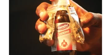 HIGH, HOOKED AND CHAINED. . .‘We chain our drug-taking son because we fear he will kill us’