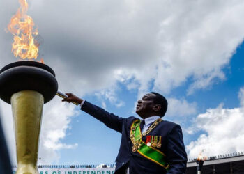 Independence flame lit, departs Harare