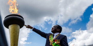 Independence flame lit, departs Harare